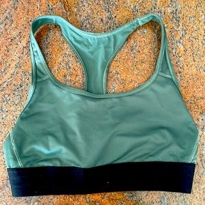 Never worn green sports bra size small.